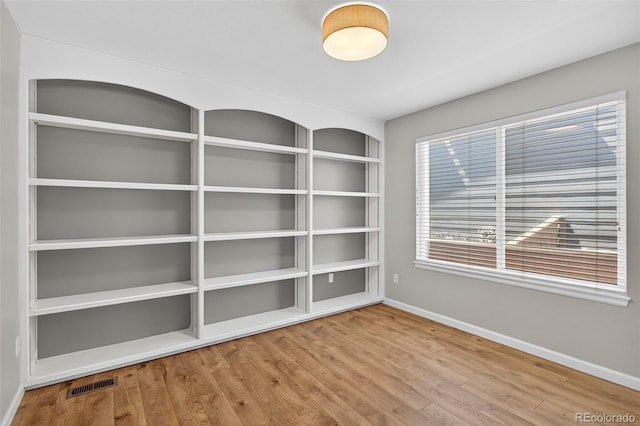 4535 Hunterwood Dr, Highlands Ranch, CO 80130 - spare room with baseboards and wood finished floors