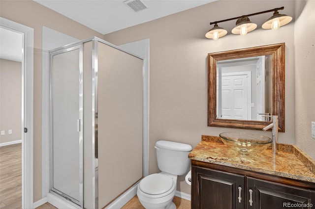4535 Hunterwood Dr, Highlands Ranch, CO 80130 - full bathroom with vanity and a shower stall