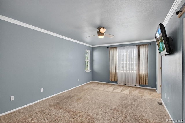 4535 Hunterwood Dr, Highlands Ranch, CO 80130 - carpeted spare room with ornamental molding, ceiling fan, and a textured ceiling