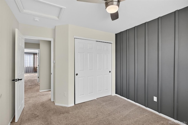 4535 Hunterwood Dr, Highlands Ranch, CO 80130 - unfurnished bedroom with light colored carpet, a closet, attic access, and ceiling fan