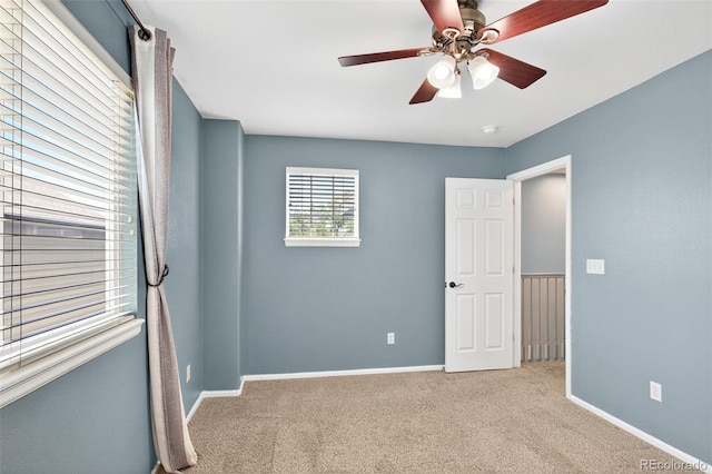 4535 Hunterwood Dr, Highlands Ranch, CO 80130 - spare room featuring carpet floors, ceiling fan, and a smoke detector