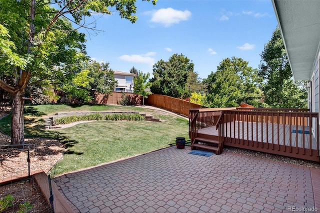 4535 Hunterwood Dr, Highlands Ranch, CO 80130 - fenced backyard with a patio and a deck