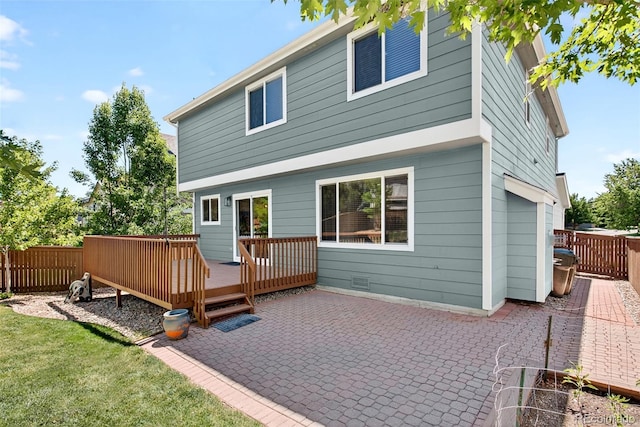 4535 Hunterwood Dr, Highlands Ranch, CO 80130 - rear view of house with a patio and a wooden deck