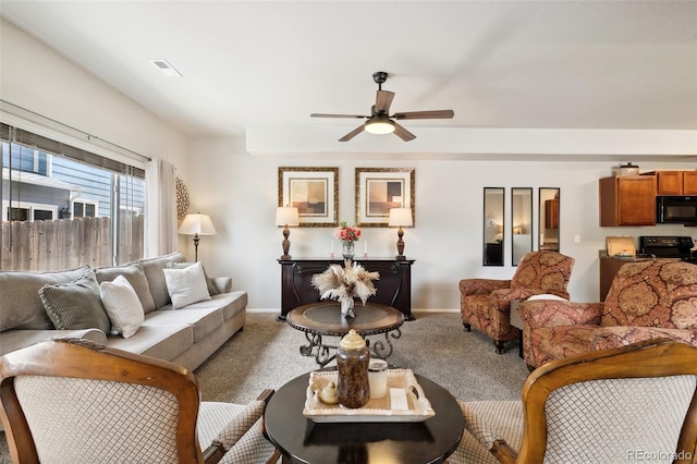 5302 Canadian Rose Vw, Colorado Springs, CO 80916 - carpeted living area featuring ceiling fan and baseboards