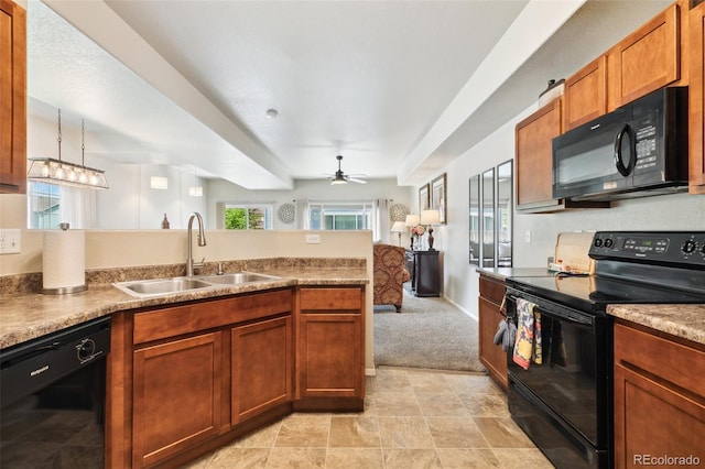 5302 Canadian Rose Vw, Colorado Springs, CO 80916 - kitchen with black appliances, a sink, ceiling fan, light colored carpet, and brown cabinets