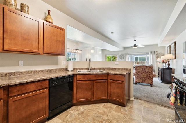 5302 Canadian Rose Vw, Colorado Springs, CO 80916 - kitchen featuring dishwasher, a sink, open floor plan, a peninsula, and a ceiling fan