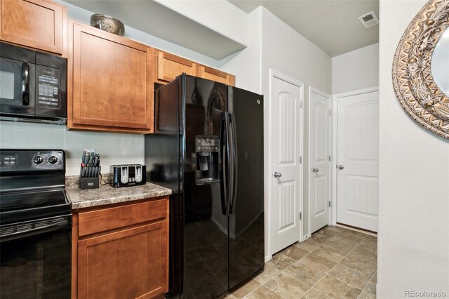 5302 Canadian Rose Vw, Colorado Springs, CO 80916 - kitchen featuring black appliances and light countertops
