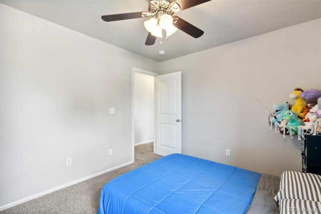 5302 Canadian Rose Vw, Colorado Springs, CO 80916 - carpeted bedroom with baseboards and ceiling fan