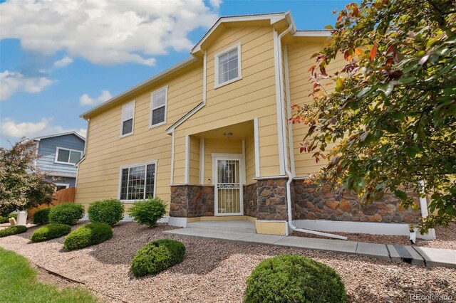 5302 Canadian Rose Vw, Colorado Springs, CO 80916 - view of front facade featuring stone siding