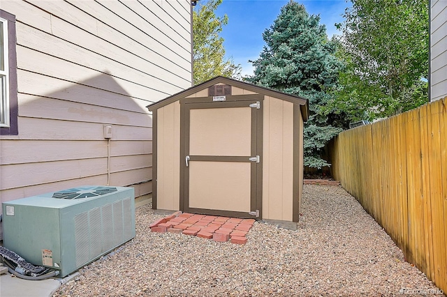 view of outbuilding featuring central air condition unit