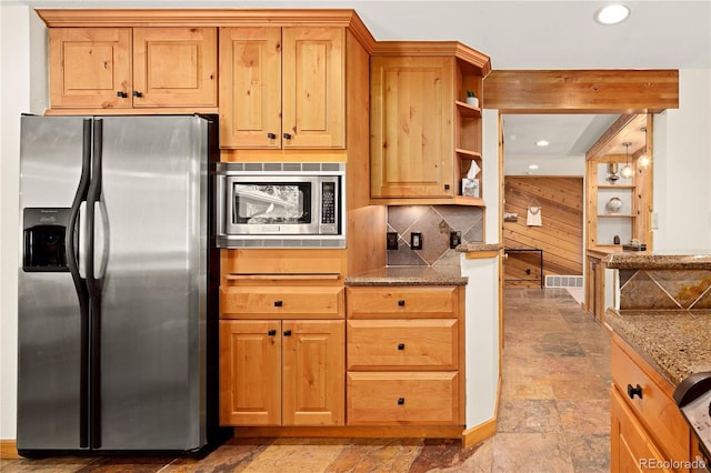 32217 Buffalo Park Rd, Evergreen, CO 80439 - kitchen with stainless steel appliances, open shelves, stone finish flooring, wooden walls, and recessed lighting