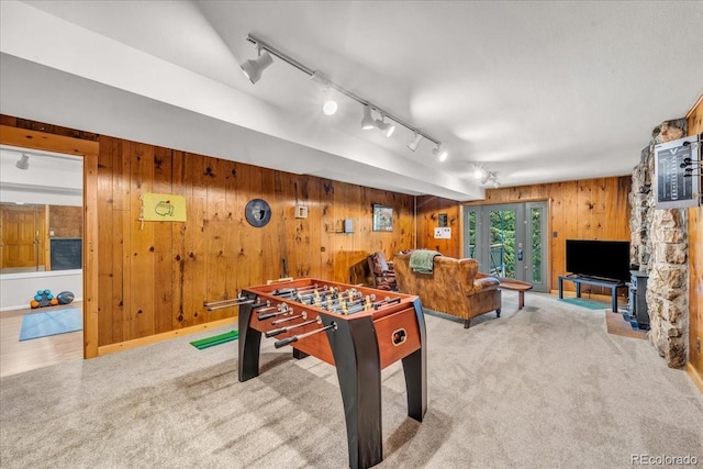 32217 Buffalo Park Rd, Evergreen, CO 80439 - game room with rail lighting, wood walls, and carpet