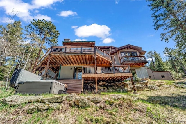32217 Buffalo Park Rd, Evergreen, CO 80439 - rear view of house featuring a wooden deck