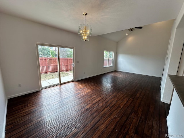 15555 E 40th Ave Unit 11, Denver, CO 80239 - spare room featuring a chandelier, lofted ceiling, and dark wood-style floors