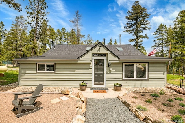 10887 Goodheart Ave, Conifer, CO 80433 - view of front of house featuring a shingled roof