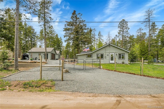 10887 Goodheart Ave, Conifer, CO 80433 - bungalow with a gate and gravel driveway