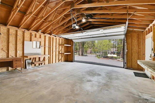 10887 Goodheart Ave, Conifer, CO 80433 - garage featuring a garage door opener