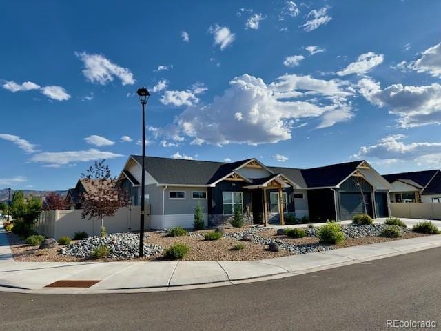 734 Flamecrest Dr, Fruita, CO 81521 - view of front of house with a garage