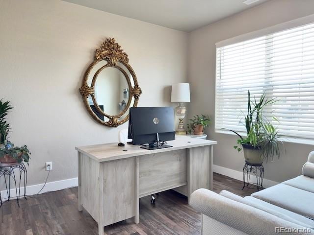 734 Flamecrest Dr, Fruita, CO 81521 - office space featuring plenty of natural light and dark wood-type flooring