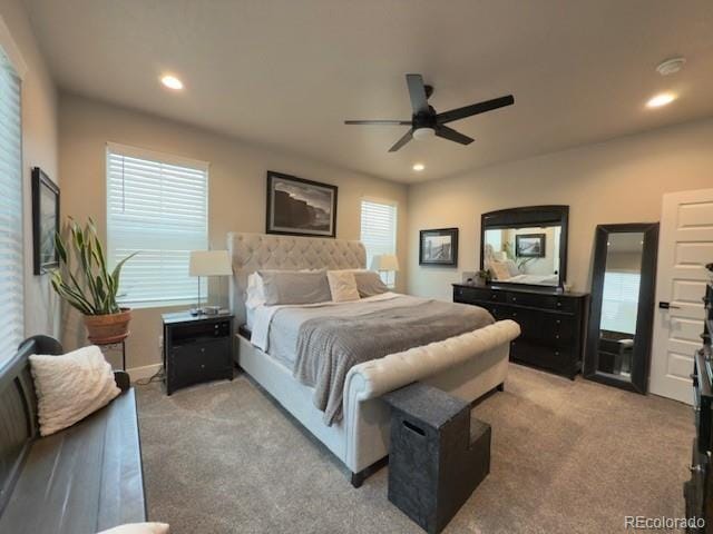 734 Flamecrest Dr, Fruita, CO 81521 - bedroom with light carpet, recessed lighting, and a ceiling fan