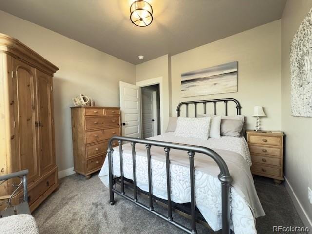 734 Flamecrest Dr, Fruita, CO 81521 - bedroom with light carpet and baseboards