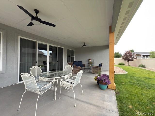 734 Flamecrest Dr, Fruita, CO 81521 - view of patio / terrace featuring a ceiling fan, outdoor lounge area, and outdoor dining space