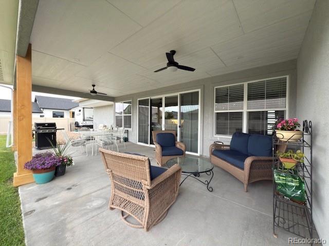 734 Flamecrest Dr, Fruita, CO 81521 - view of patio / terrace featuring grilling area, outdoor lounge area, and ceiling fan