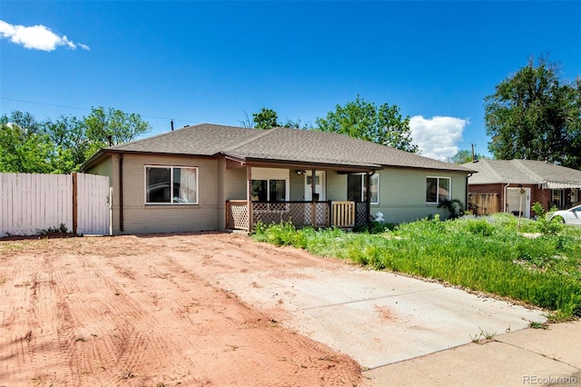 1151 Revere St, Aurora, CO 80011 - view of front facade with covered porch