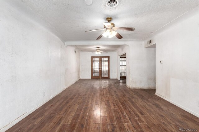 1151 Revere St, Aurora, CO 80011 - unfurnished room featuring french doors, wood finished floors, a textured ceiling, a ceiling fan, and baseboards