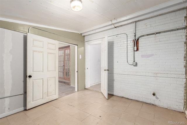 1151 Revere St, Aurora, CO 80011 - below grade area with light tile patterned floors