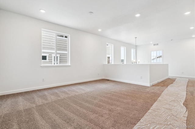 8462 Eagle River St, Littleton, CO 80125 - unfurnished room with light carpet, baseboards, visible vents, and recessed lighting