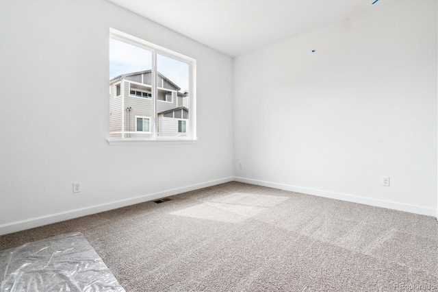 8462 Eagle River St, Littleton, CO 80125 - unfurnished room with baseboards, carpet floors, and visible vents