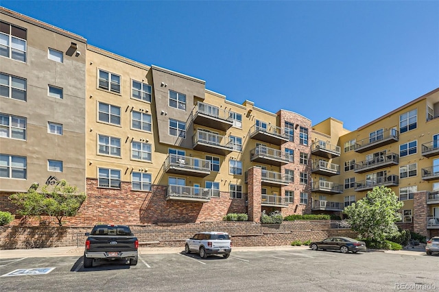 9079 E Panorama Cir Unit 419, Englewood, CO 80112 - view of apartment building / complex featuring uncovered parking