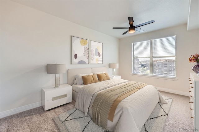 9079 E Panorama Cir Unit 419, Englewood, CO 80112 - carpeted bedroom with baseboards and a ceiling fan