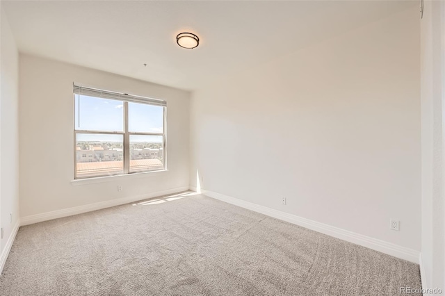 9079 E Panorama Cir Unit 419, Englewood, CO 80112 - carpeted empty room with baseboards