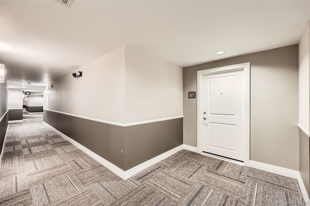 9079 E Panorama Cir Unit 419, Englewood, CO 80112 - hall featuring carpet flooring, baseboards, and recessed lighting