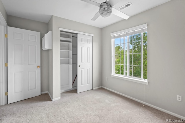 1160 S Fultondale Ct, Aurora, CO 80018 - unfurnished bedroom featuring light carpet, baseboards, and a closet