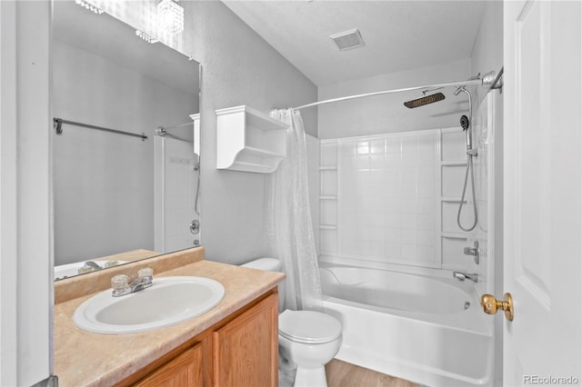 1160 S Fultondale Ct, Aurora, CO 80018 - bathroom with toilet, shower / bathtub combination with curtain, and vanity