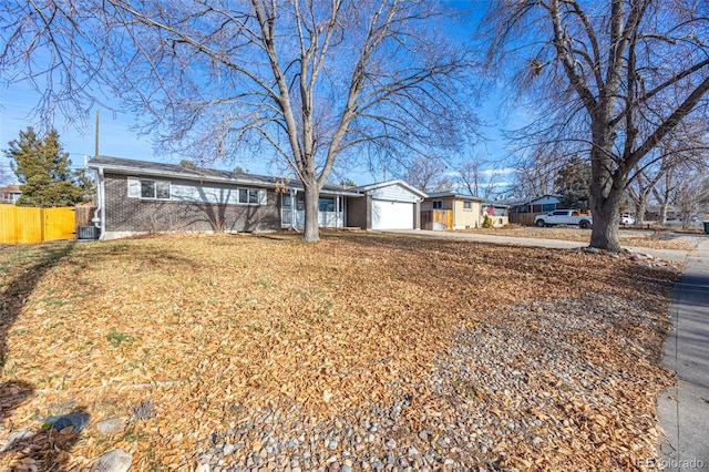 single story home with central AC unit