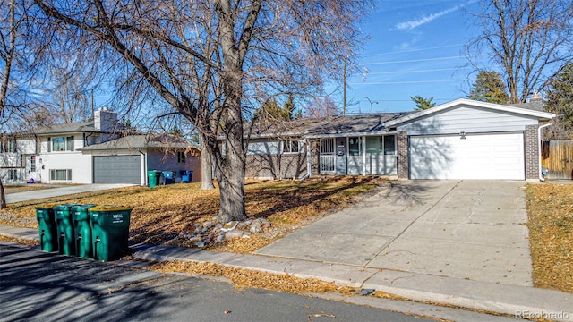 single story home with a garage