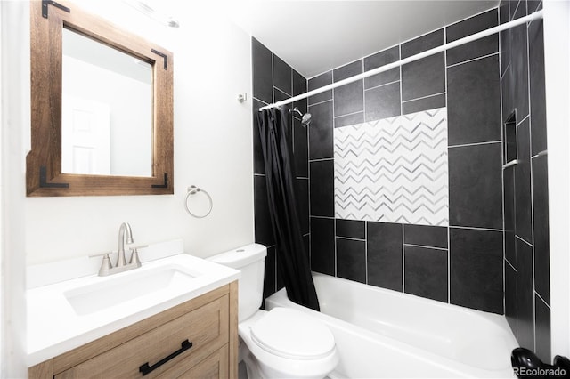 full bathroom with shower / tub combo with curtain, vanity, and toilet