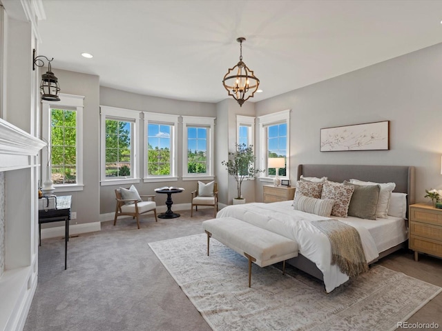 6995 S Ensenada St, Aurora, CO 80016 - bedroom featuring multiple windows, a chandelier, recessed lighting, baseboards, and carpet