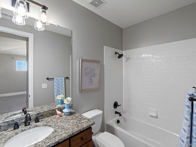 6995 S Ensenada St, Aurora, CO 80016 - bathroom with vanity, toilet, and shower / tub combination