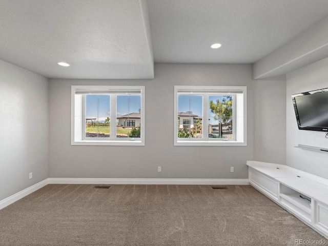 6995 S Ensenada St, Aurora, CO 80016 - carpeted empty room featuring baseboards and recessed lighting