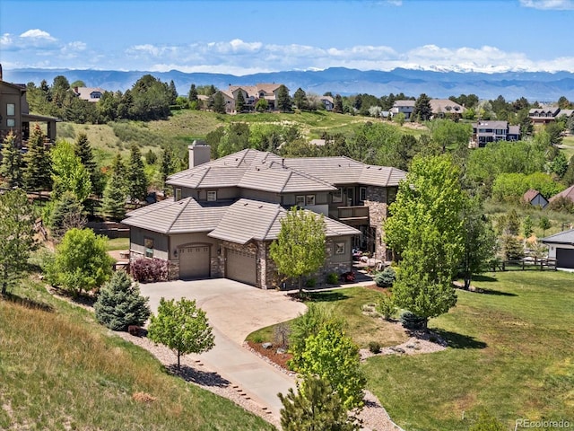 6995 S Ensenada St, Aurora, CO 80016 - view from above of property with a mountainous background
