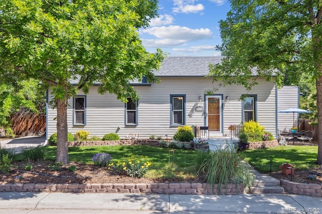2311 W 46th Ave, Denver, CO 80211 - view of front of house with a shingled roof