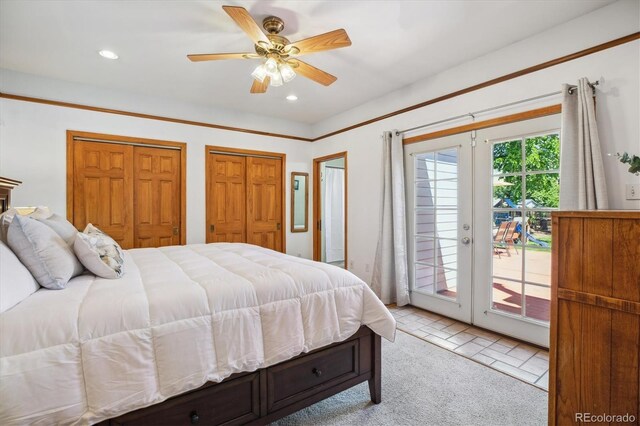 2311 W 46th Ave, Denver, CO 80211 - bedroom featuring access to outside, light carpet, french doors, recessed lighting, and two closets