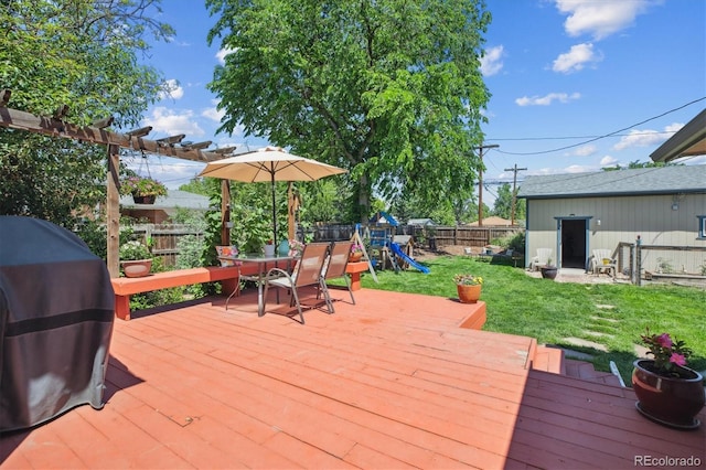 2311 W 46th Ave, Denver, CO 80211 - wooden terrace with a playground and a grill