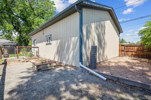 2311 W 46th Ave, Denver, CO 80211 - view of side of home featuring a vegetable garden
