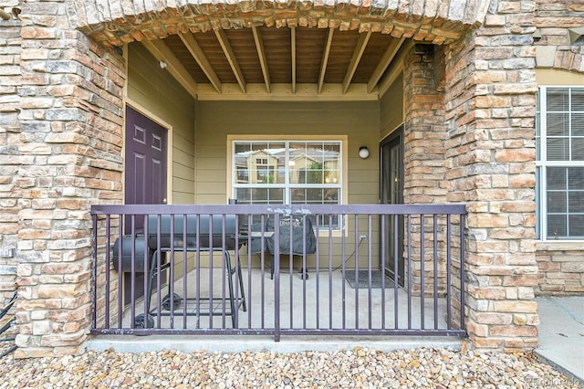 17442 Nature Walk Trl Unit 105, Parker, CO 80134 - entrance to property featuring stone siding and a porch